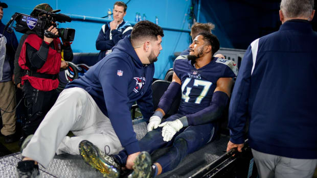 Tennessee Titans safety Andrew Adams (47) is carted off after an injury during the fourth quarter against the Dallas Cowboys at Nissan Stadium Thursday, Dec. 29, 2022, in Nashville, Tenn.
